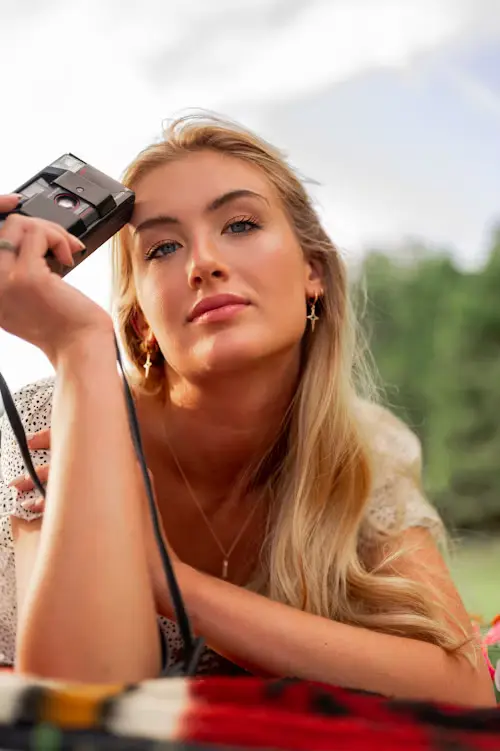 Outdoor headshot photography of a woman with long blonde hair
